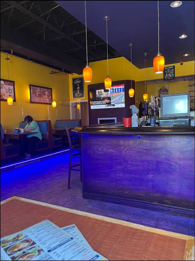 Bar top counter with vibrant blue underglow lighting