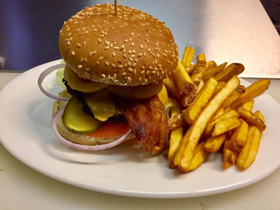 Westney Burger — homemade patty with bacon, cheese, pickles and crispy fries